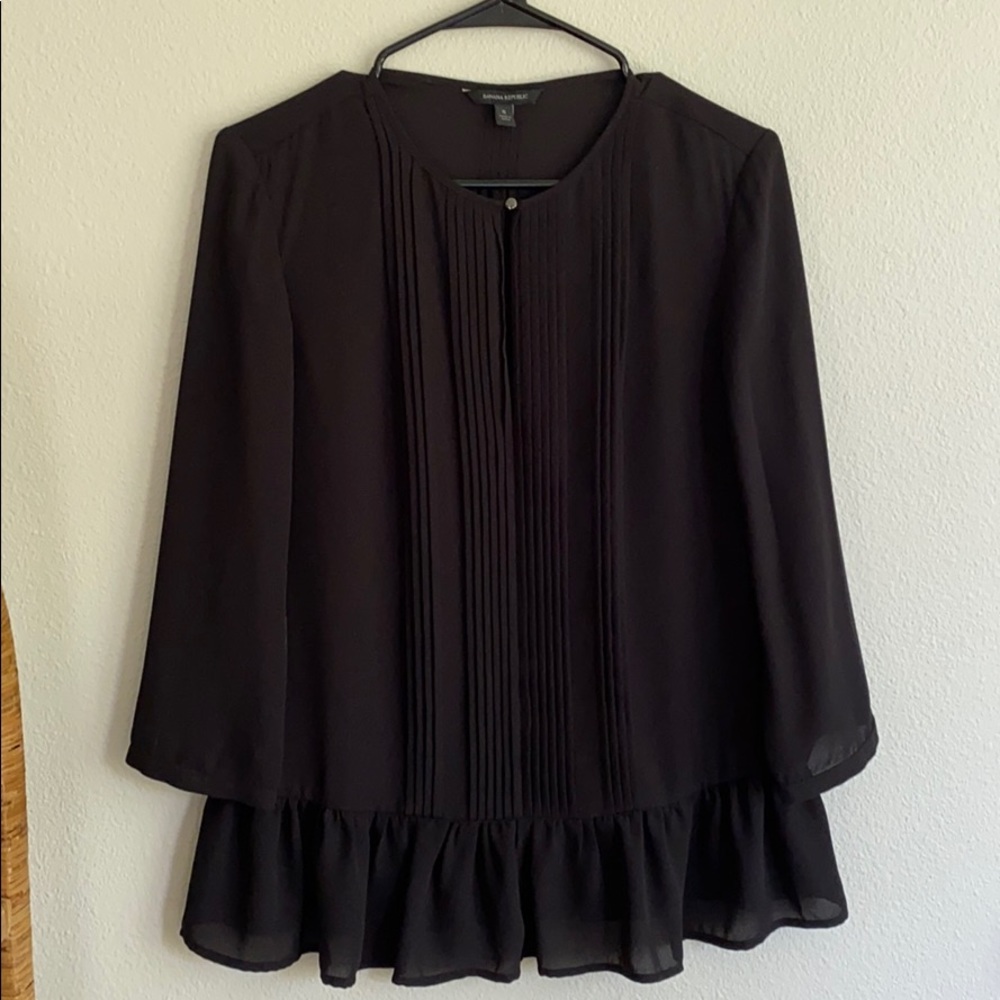 Ruffle hem peplum blouse